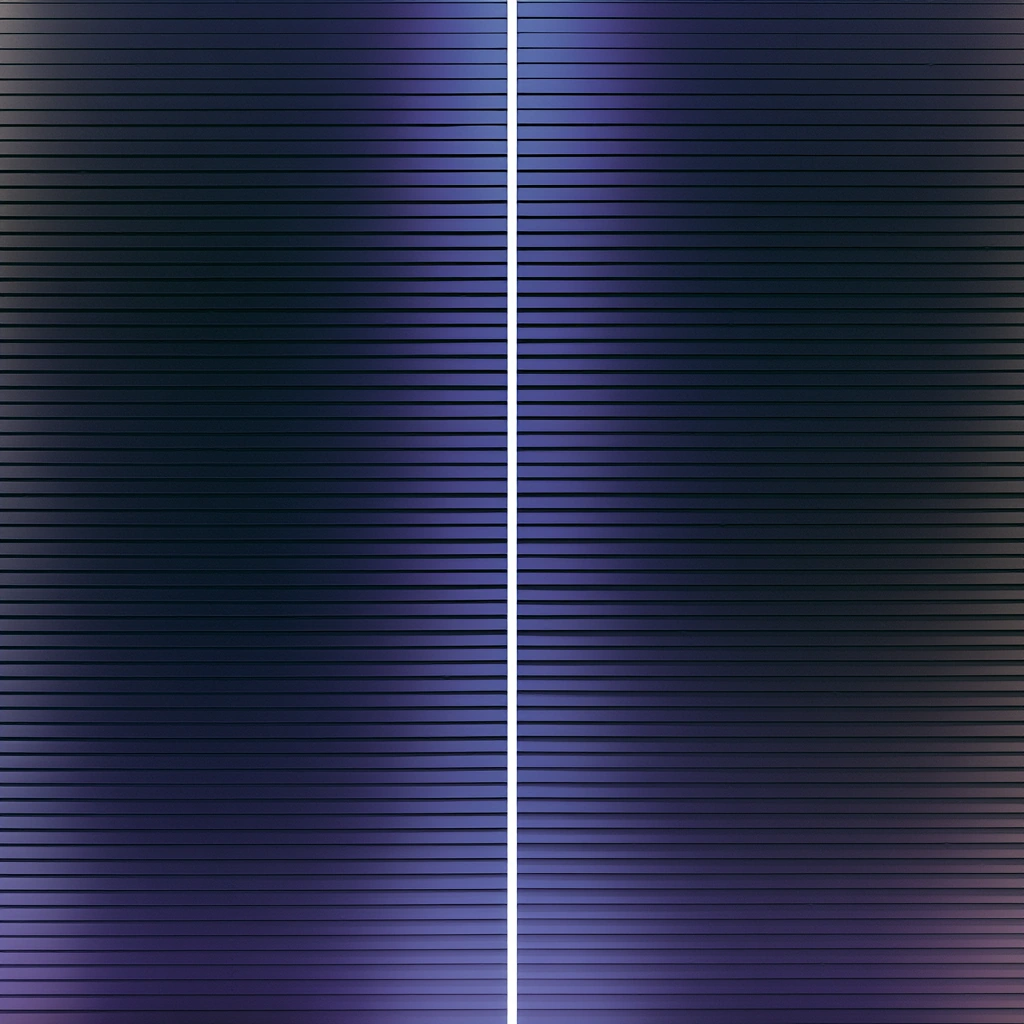 A stratified field of horizontal layers cut top to bottom by one narrow bright vertical channel.